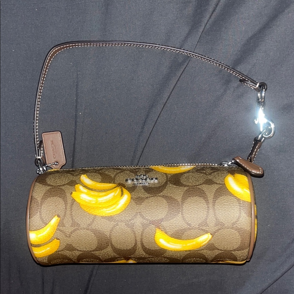 Coach Nolita Barrel Bag with monogram and Banana print